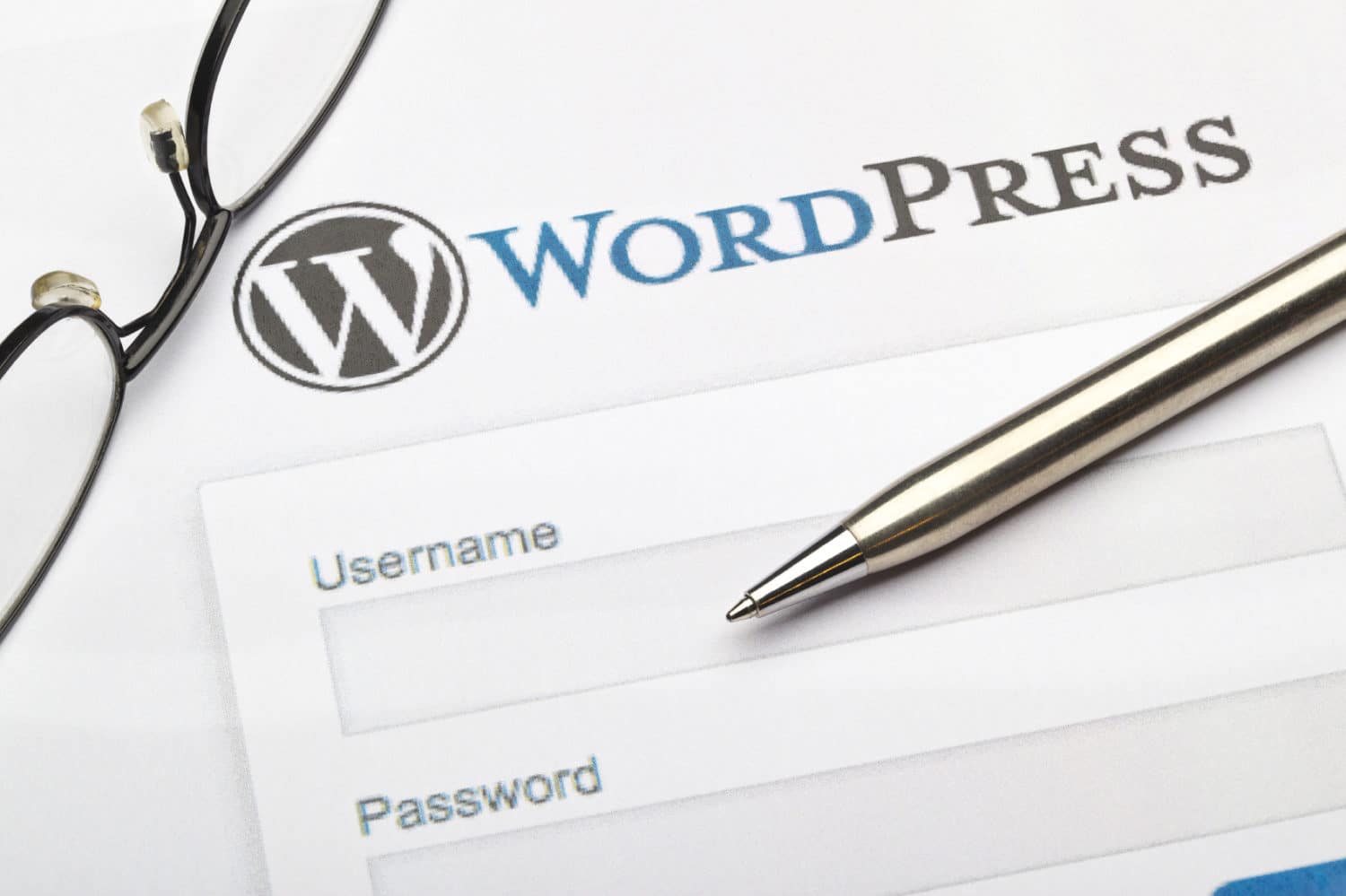 Digital marketing and Wordpress image example with pen and screen showing.
